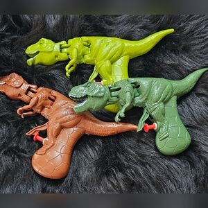 Dinosaur squirt guns